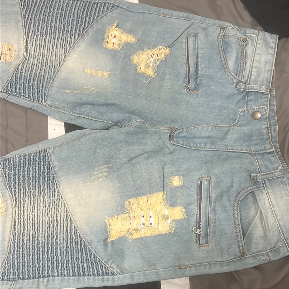 Distressed Light Blue Jeans